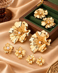 Boucles d’oreilles fleurs dorées en acier inoxydable