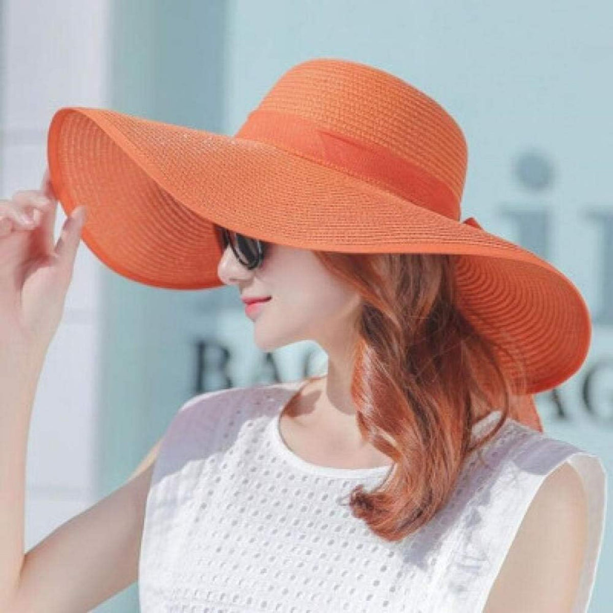 Chapeau capeline orange porté